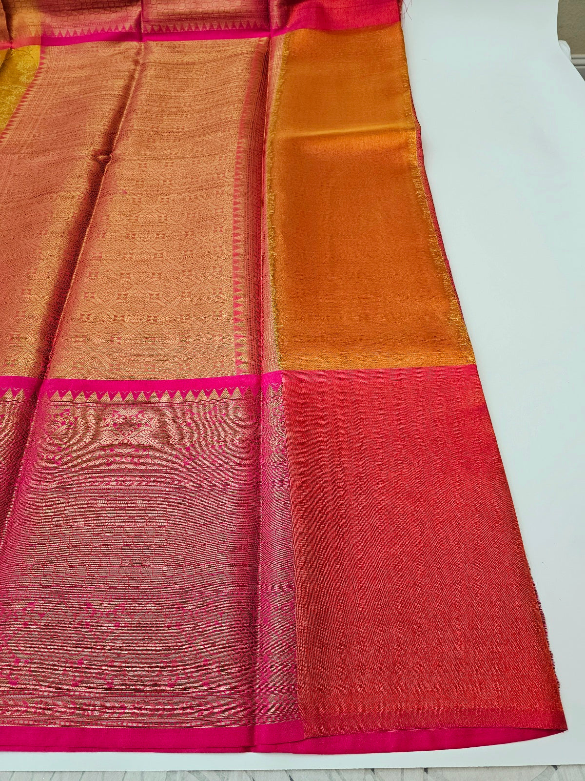 Women's Saree : Elegant Tissue Silk Saree, accompanied by an unstitched running blouse