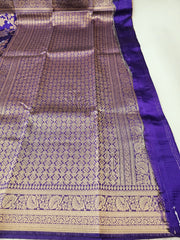 Women's Saree : Elegant Tissue Silk Saree, accompanied by an unstitched running blouse