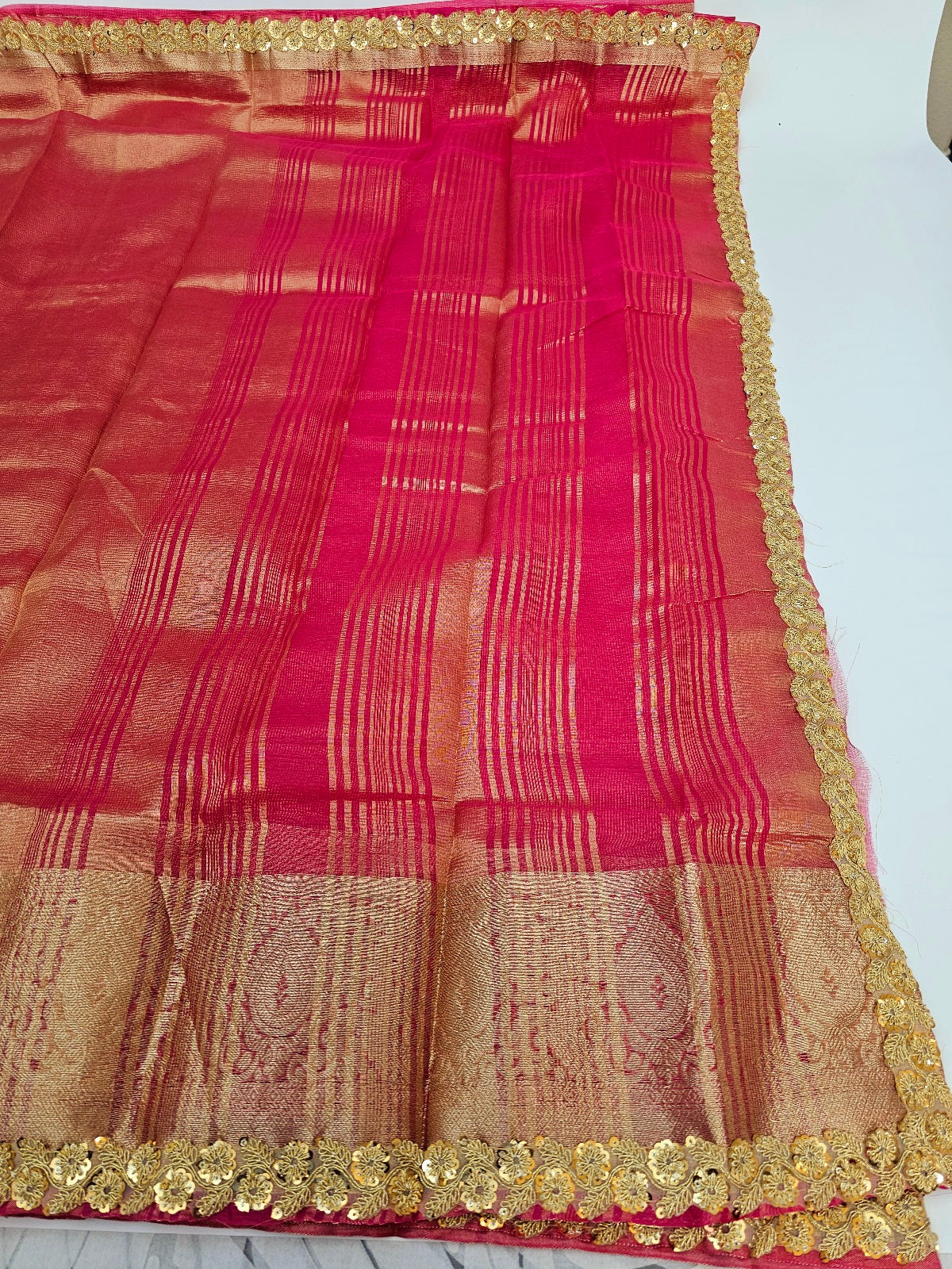 Women's Saree : Elegant Tissue Silk Saree, accompanied by an unstitched running blouse