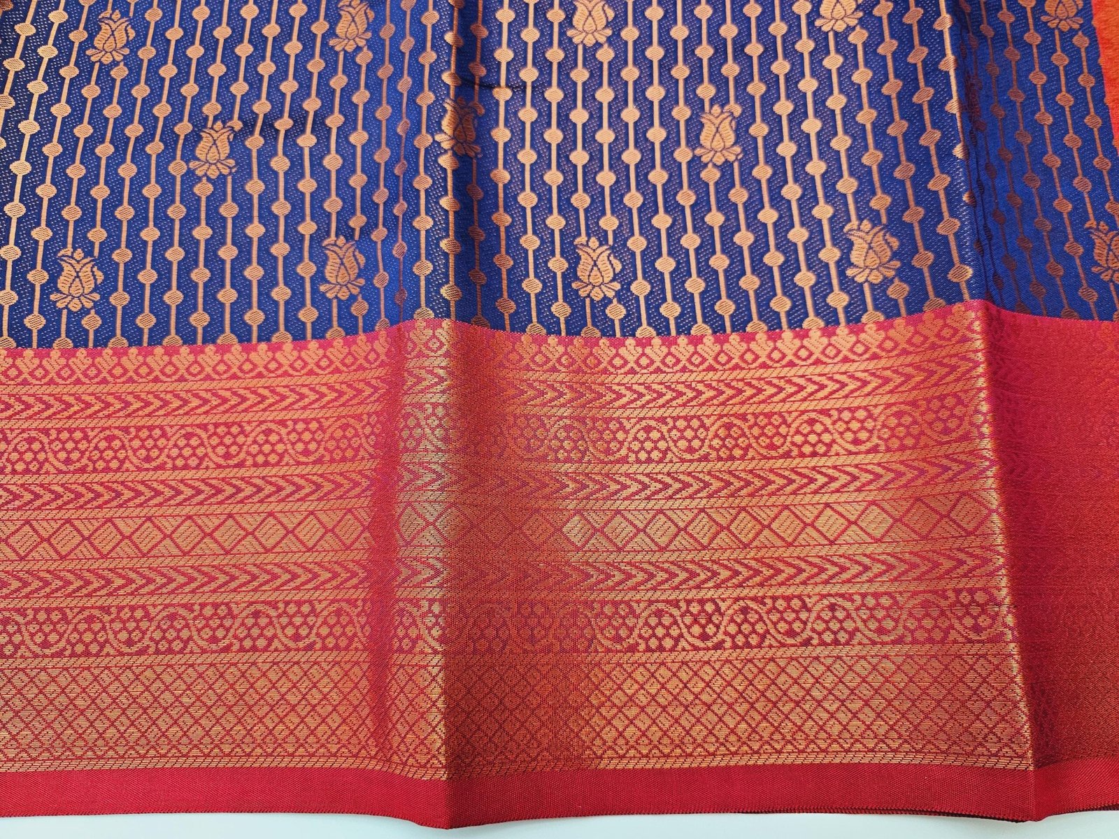 il_fullxfull.6274480852_knqc.jpg Elegant Soft Silk Saree: Blue & Red Weaving, Stitched Designer Blouse - Image 9